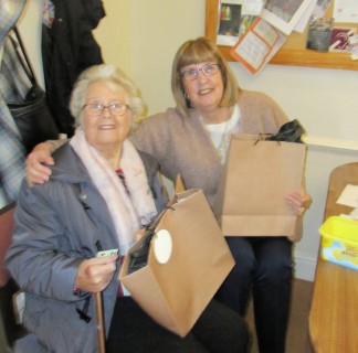 Paul gave Chris and Sheila a gift bag for services rendered